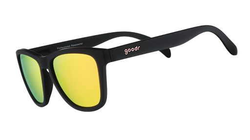 Three-quarter angle view of black sunglasses with square-shaped hot pink reflective lenses.